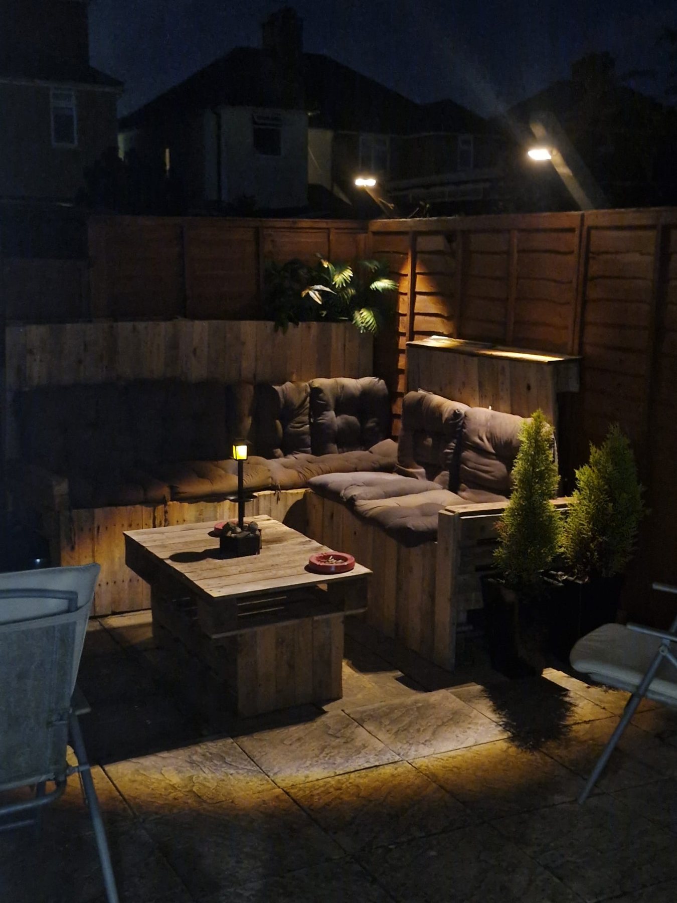 The Double Seven Club outside seating area at night