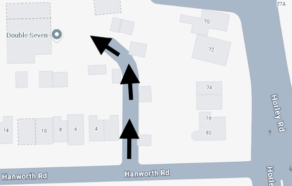 Map with arrows from Hanworth Road towards the Double Seven Club entrance behind the buildings
